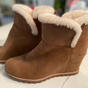 Rarely worn, extremely comfortable UGG 3" hidden wedge bootie. Fleece lined 8.5